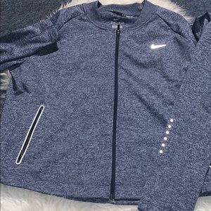 Blue women’s Nike dri fit sweater with zipper
